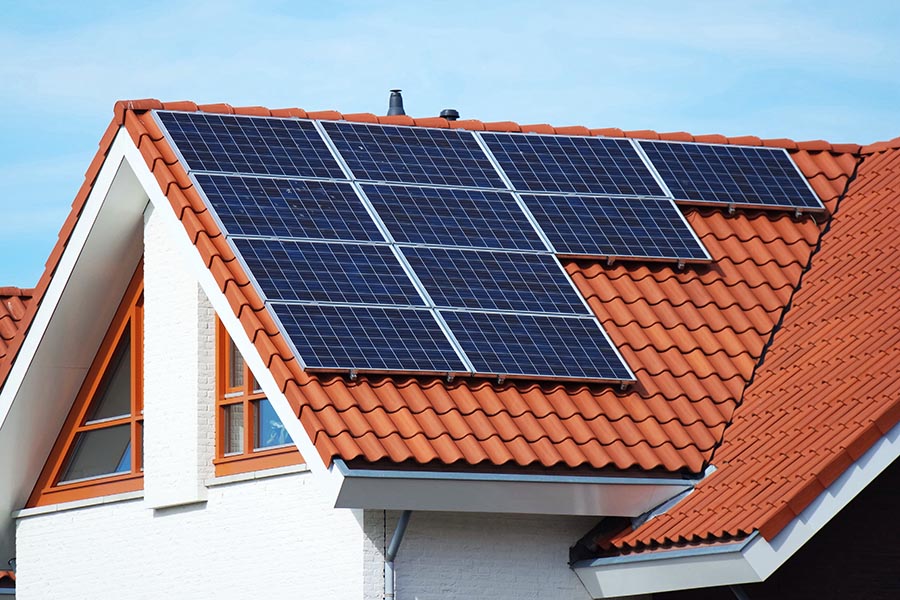 Solar panels on your home's roof can charge a battery.